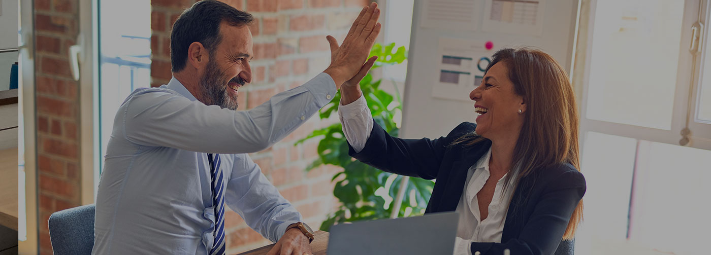 Two people high-fiving