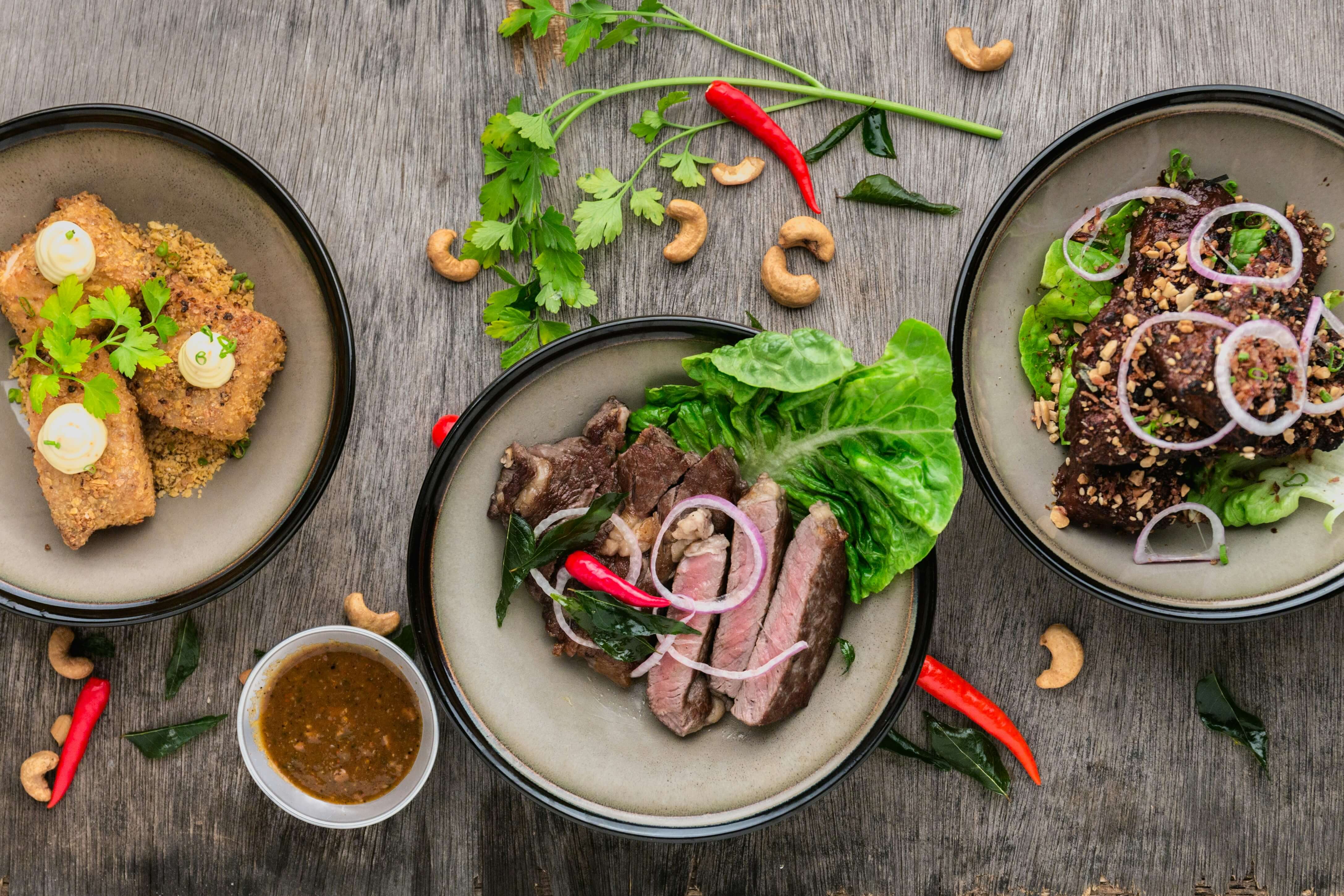 Three dishes on a restaurant table